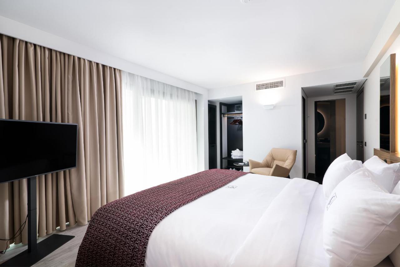 S Hotel Boutique Thessaloníki Eksteriør billede A bedroom at the hotel